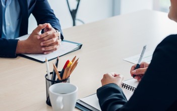 Close up interviewer interview candidate apply for job at meeting room in office