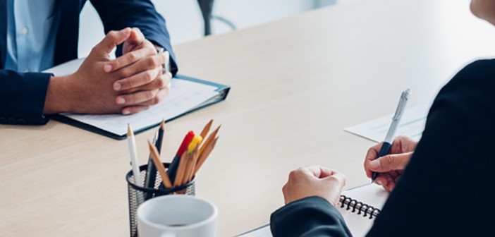 Close up interviewer interview candidate apply for job at meeting room in office