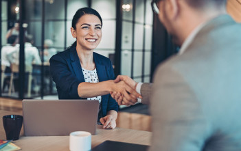 Business persons talking in the office