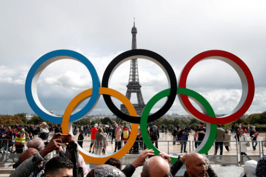 FILE PHOTO: Olympic rings to celebrate the IOC official announcement that Paris won the 2024 Olympic bid are seen in front of the Eiffel Tower at the Trocadero square in Paris, France, September 16, 2017. REUTERS/Benoit Tessier/File Photo