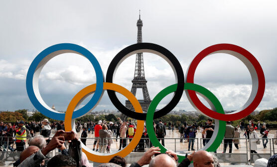 FILE PHOTO: Olympic rings to celebrate the IOC official announcement that Paris won the 2024 Olympic bid are seen in front of the Eiffel Tower at the Trocadero square in Paris, France, September 16, 2017. REUTERS/Benoit Tessier/File Photo
